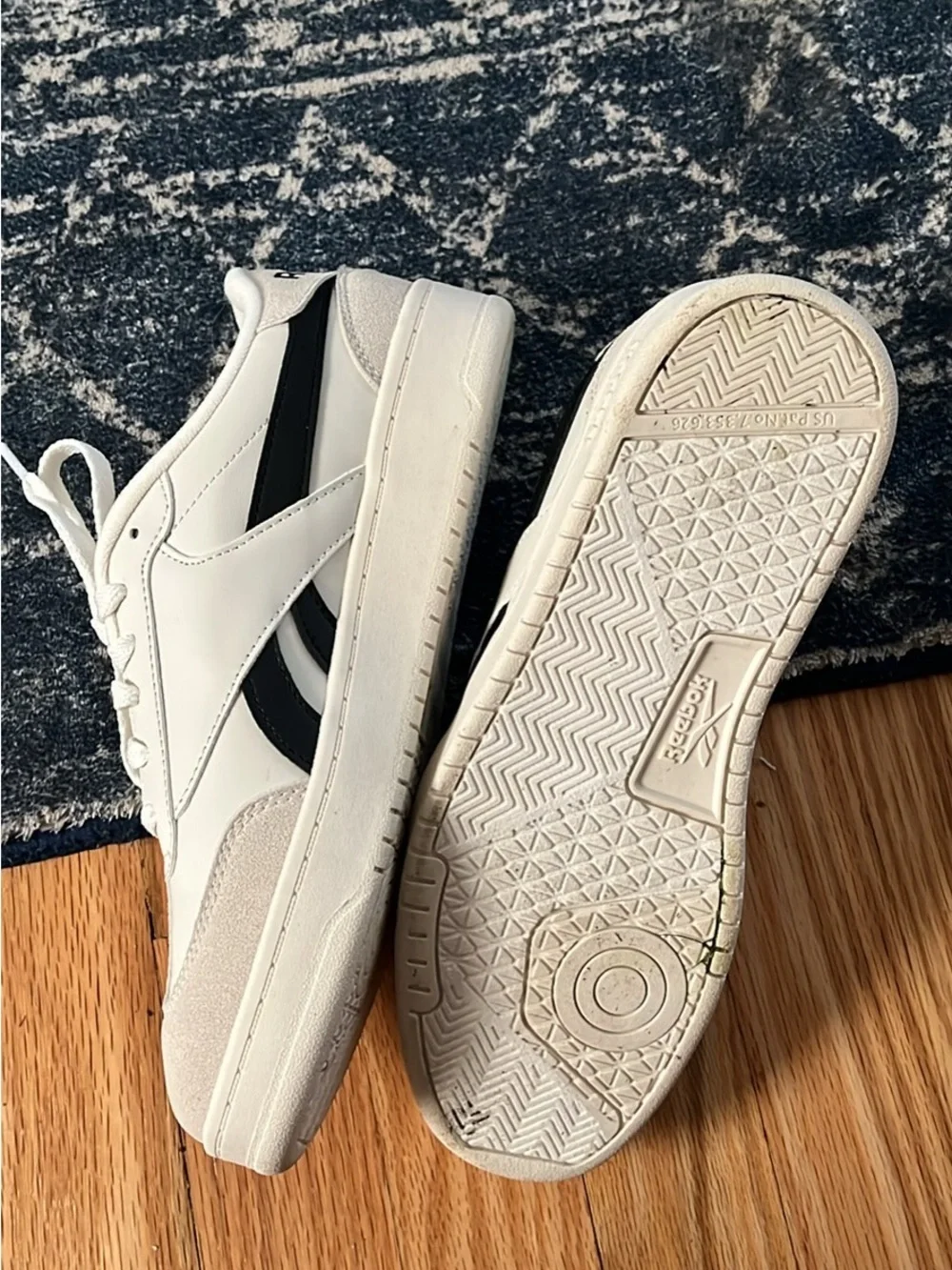 Reebok Cream and Black Low-Top Sneakers